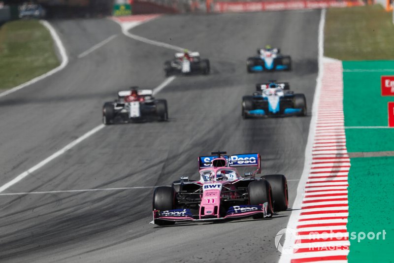 Sergio Perez, Racing Point RP19, leads Kimi Raikkonen, Alfa Romeo Racing C38, and George Russell, Williams Racing FW42