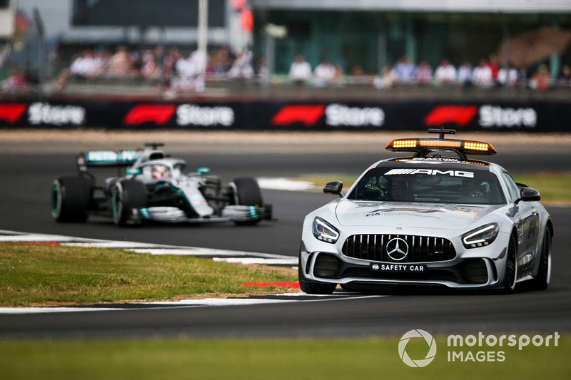 The Safety Car leads Lewis Hamilton, Mercedes AMG F1 W10