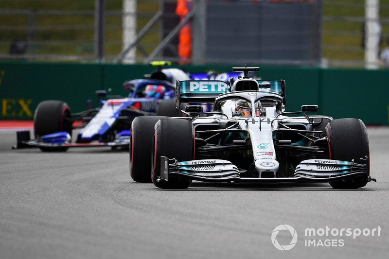 Lewis Hamilton, Mercedes AMG F1 W10, leads Pierre Gasly, Toro Rosso STR14