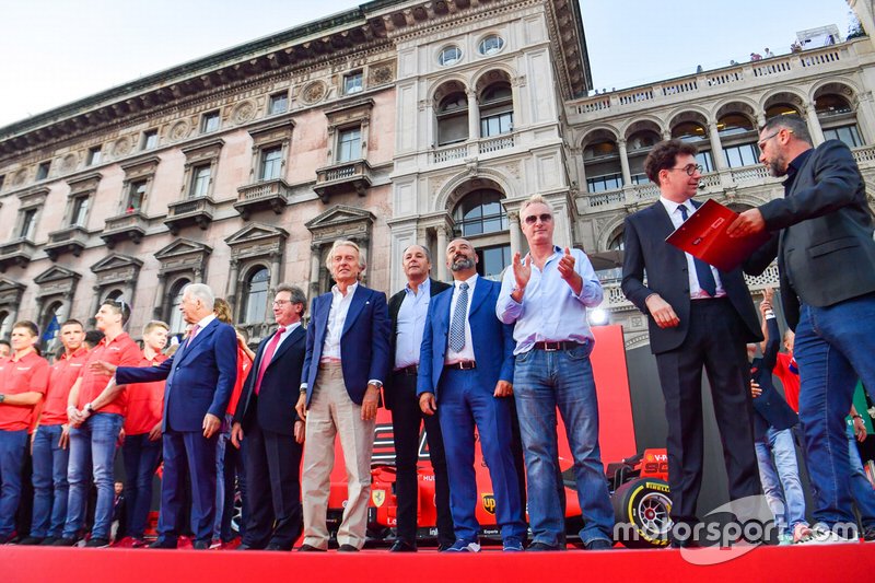Luca di Montezemolo, Gerhard Berger, Ivan Capelli, Eddie Irvine, and Mattia Binotto on stage