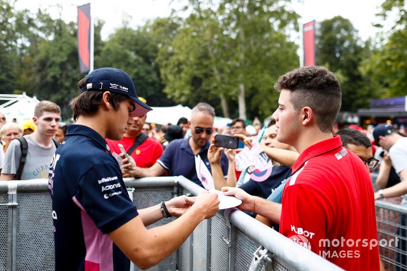 Lance Stroll, Racing Point signs an autograph for a fan