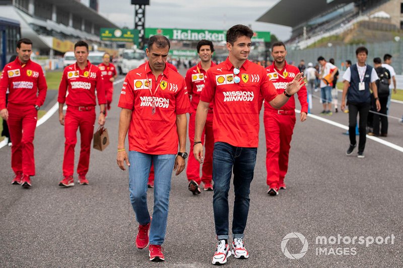 Charles Leclerc, Ferrari walks the track with Marc Gené