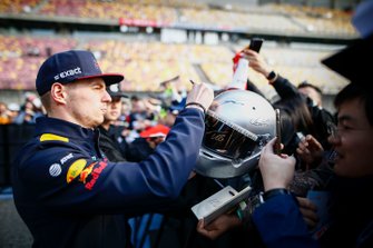 Max Verstappen, Red Bull Racing signs an autograph for a fan