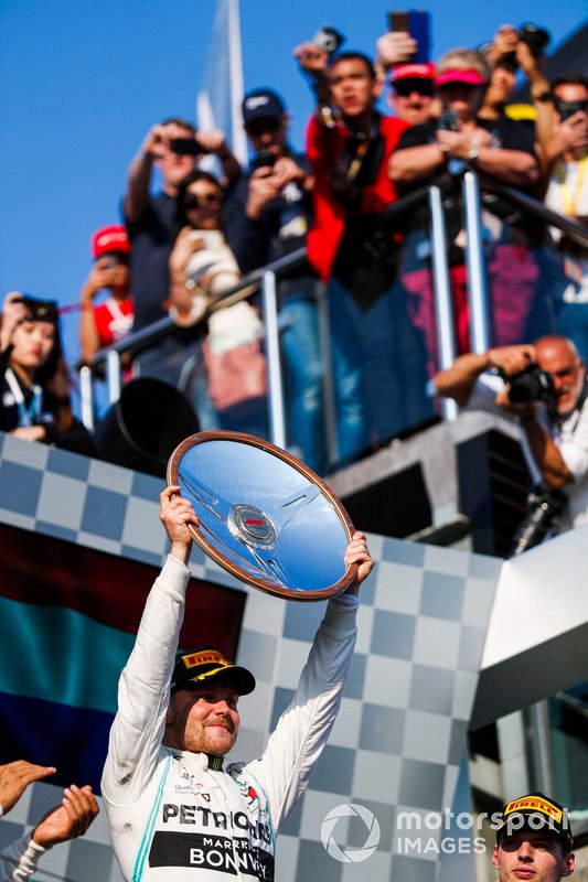 Valtteri Bottas, Mercedes AMG F1 celebrates on the podium with the trophy