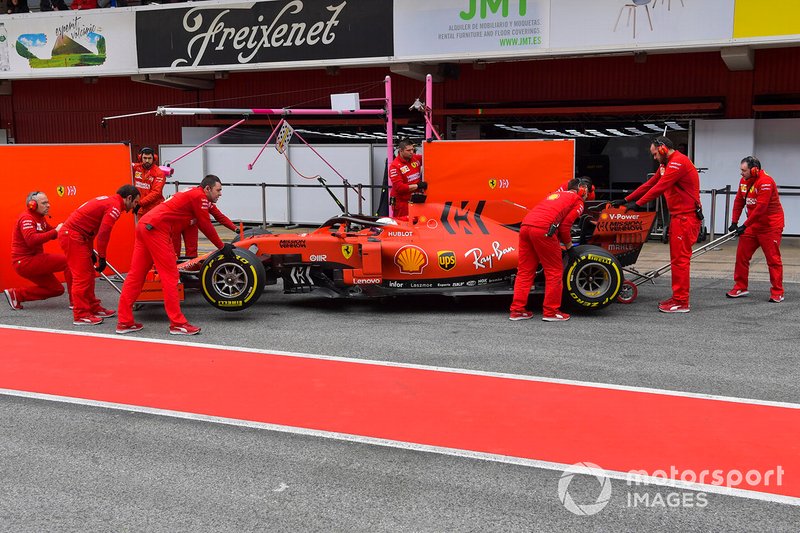 Sebastian Vettel, Ferrari SF90, makes a pit stop