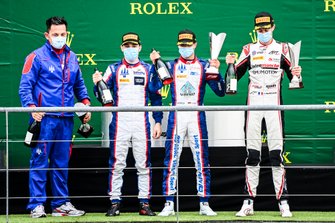 David Beckmann, Trident, Race Winner Lirim Zendeli, Trident and Theo Pourchaire, ART Grand Prix celebrate on the podium with the trophy and the champagne
