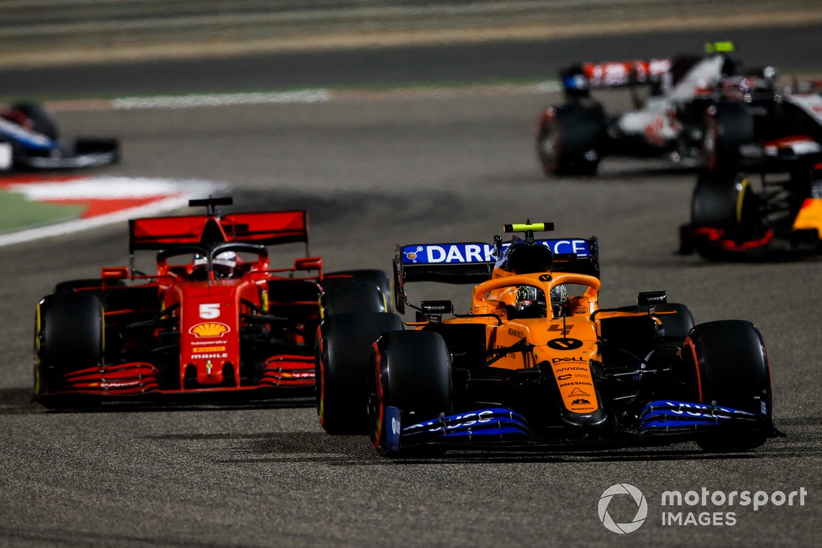 Lando Norris, McLaren MCL35, Sebastian Vettel, Ferrari SF1000