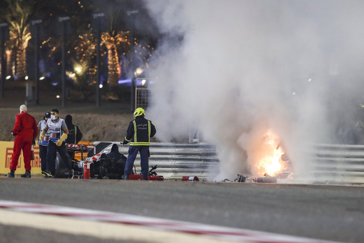 Marshals work to put the fire out at the scene of the accident