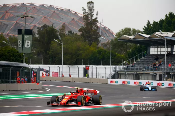 Charles Leclerc, Ferrari SF90, leads Nicholas Latifi, Williams FW42
