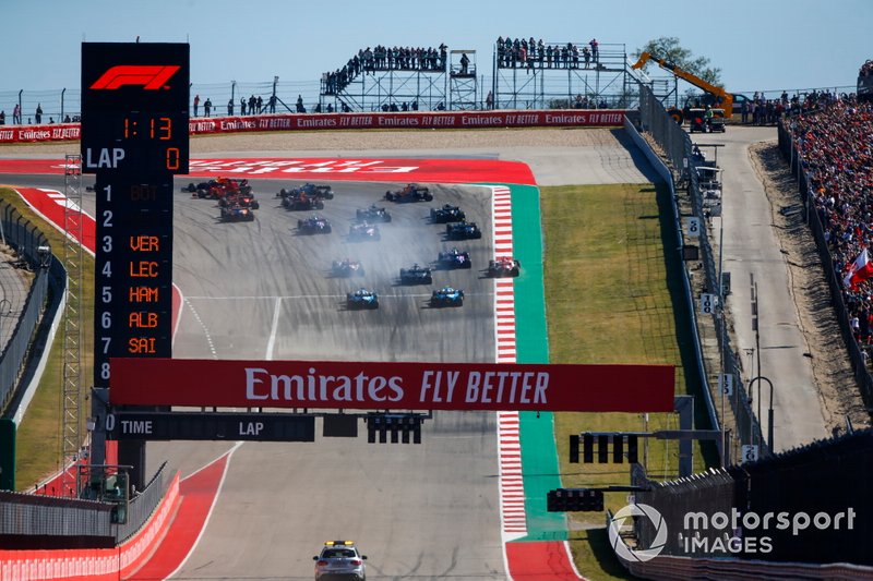 Valtteri Bottas, Mercedes AMG W10, Sebastian Vettel, Ferrari SF90, Max Verstappen, Red Bull Racing RB15, Charles Leclerc, Ferrari SF90, Lewis Hamilton, Mercedes AMG F1 W10, and Alex Albon, Red Bull Racing RB15, lead the field into the first corner