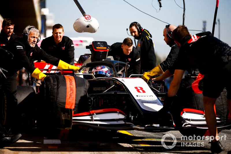 Romain Grosjean, Haas VF-20 being pushed into the garage by mechanics