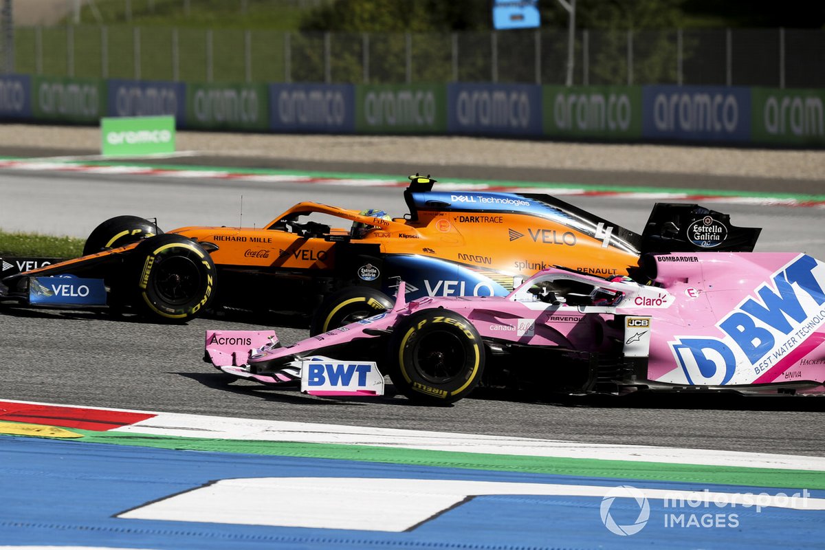 Lando Norris, McLaren MCL35, passes Sergio Perez, Racing Point RP20