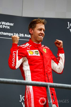 Winner Sebastian Vettel, Ferrari, celebrates on the podium