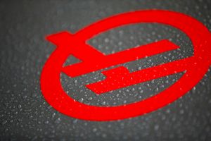 Haas F1 logo with rain water