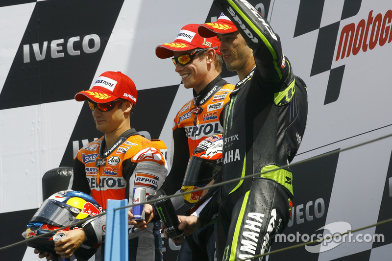 Podio: 1º Casey Stoner, 2º Dani Pedrosa, 3º Andrea Dovizioso