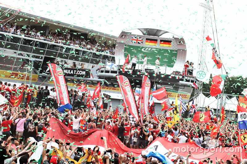 The podium (L to R): Lewis Hamilton, Mercedes AMG F1, second; Nico Rosberg, Mercedes AMG F1, race winner; Sebastian Vettel, Ferrari, third