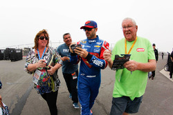 Jimmie Johnson, Hendrick Motorsports Chevrolet signing autographs for fans