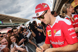 Sebastian Vettel, Ferrari signs autographs for the fans