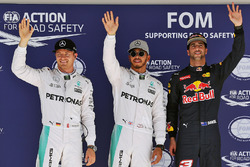 Qualifying top three in parc ferme (L to R): Nico Rosberg, Mercedes AMG F1, second; Lewis Hamilton,