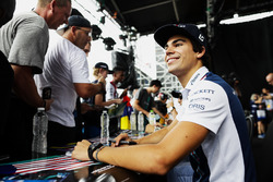 Lance Stroll, Williams, signs autographs for fans