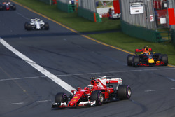 Kimi Raikkonen, Ferrari SF70H, leads Max Verstappen, Red Bull Racing RB13, and Felipe Massa, William