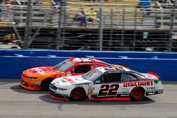 Kyle Larson, Chip Ganassi Racing Chevrolet and Joey Logano, Team Penske Ford