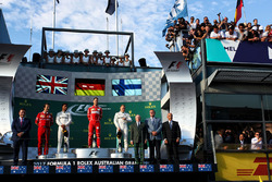 Podium: winner Sebastian Vettel, Ferrari, second place Lewis Hamilton, Mercedes AMG F1, third place Valtteri Bottas, Mercedes AMG F1