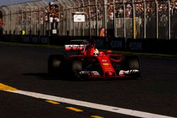 Sebastian Vettel, Ferrari SF70H, takes the chequered flag for victory