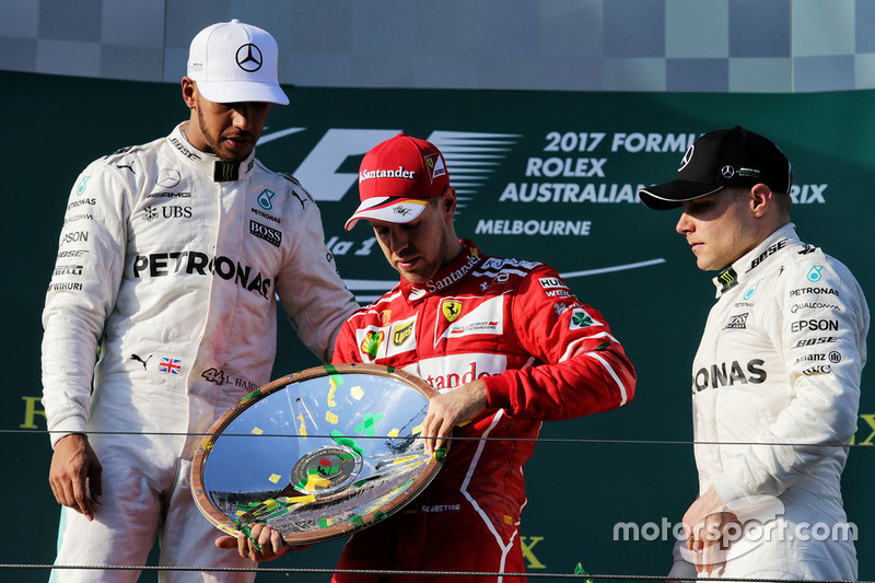 Podio: il vincitore della gara Sebastian Vettel, Ferrari, il secondo classificato Lewis Hamilton, Mercedes AMG F1, il terzo classificato Valtteri Bottas, Mercedes AMG F1