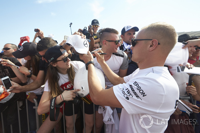 Valtteri Bottas, Mercedes AMG F1, signs autographs for fans