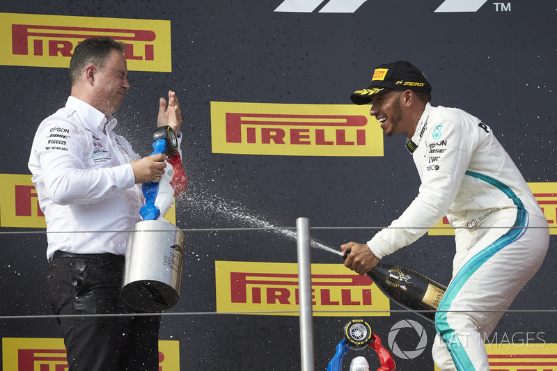 Lewis Hamilton, Mercedes AMG F1, 1st position, sprays Champagne at Ron Meadows, Sporting Director, Mercedes AMG, on the podium