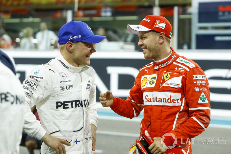 Il primo qualificato Valtteri Bottas, Mercedes AMG F1 e il terzo qualificato Sebastian Vettel, Ferrari
