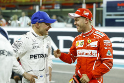 Top qualifyer Valtteri Bottas, Mercedes AMG F1 and third place Sebastian Vettel, Ferrari