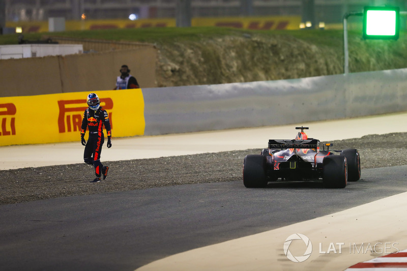 Daniel Ricciardo, Red Bull Racing RB14 Tag Heuer, walks away from his car after retiring early in the race with technical issues