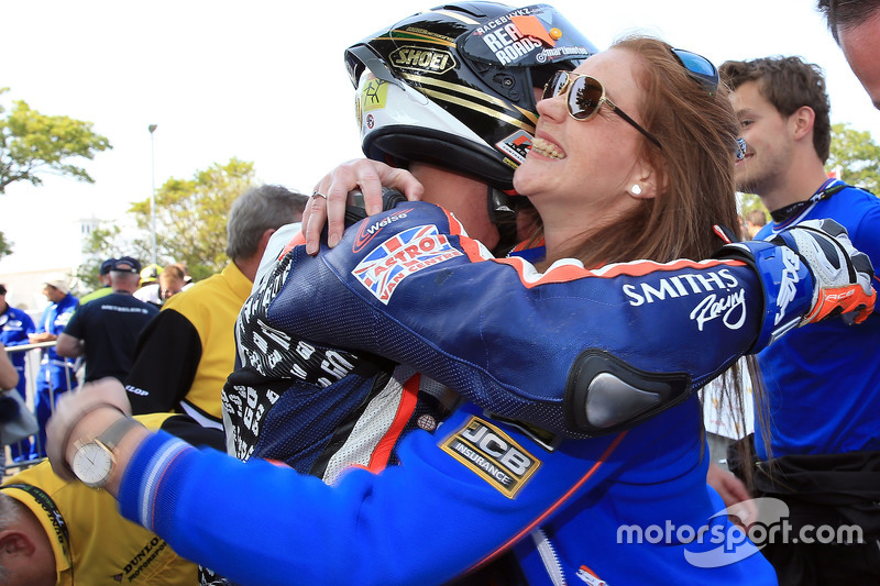 Peter Hickman is congratulated by team boss Rebecca Smith after winning the RL360º Superstock TT