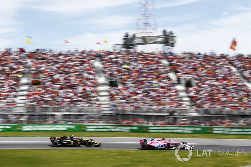 Esteban Ocon, Force India VJM11, leads Carlos Sainz Jr., Renault Sport F1 Team R.S. 18