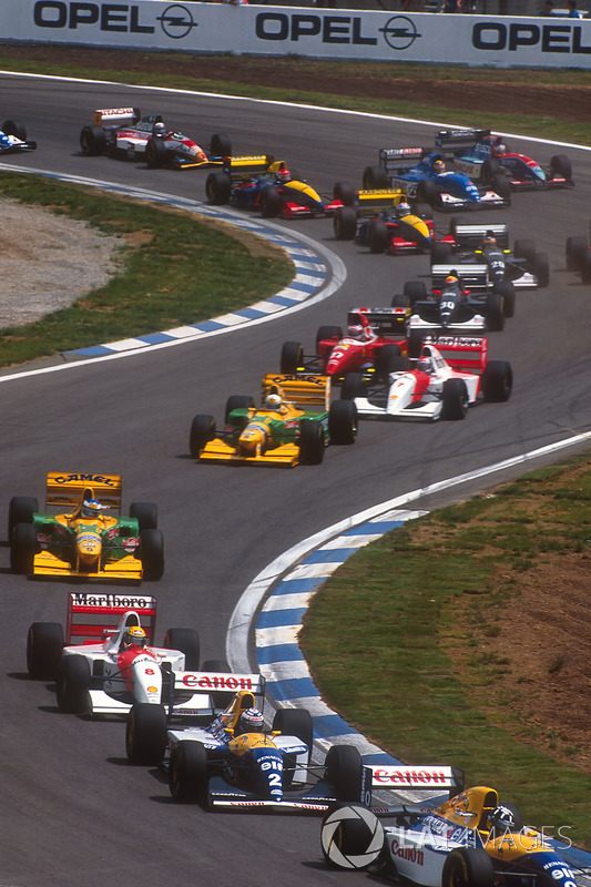 Damon Hill leads Alain Prost, both Williams FW15C Renault's, Ayrton Senna, McLaren MP4/8 Ford, Michael Schumacher, Riccardo Patrese, both Benetton B193B Ford's, Michael Andretti, McLaren MP4/8 Ford, and Jean Alesi, Ferrari F93A, at the start