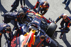 Daniel Ricciardo, Red Bull Racing RB14, being pushed back into the garage