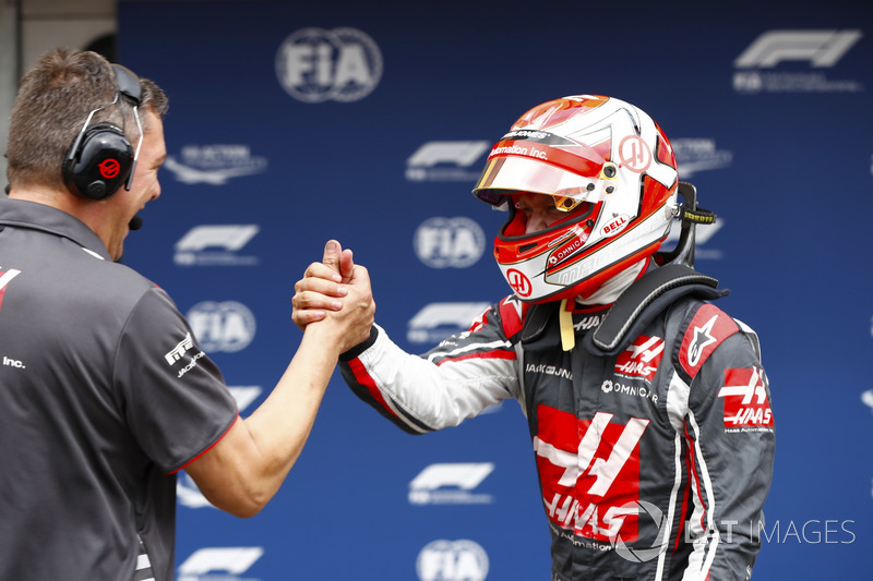 Kevin Magnussen, Haas F1 Team, celebrates after qualifying with a team member