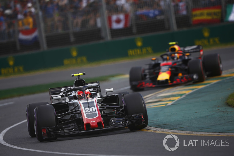 Kevin Magnussen, Haas F1 Team VF-18 Ferrari, leads Max Verstappen, Red Bull Racing RB14 Tag Heuer