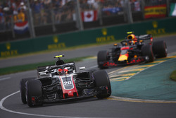 Kevin Magnussen, Haas F1 Team VF-18 Ferrari, leads Max Verstappen, Red Bull Racing RB14 Tag Heuer
