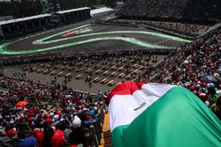 Sergio Perez, Sahara Force India VJM10 passes Mexican flag in the grandstand