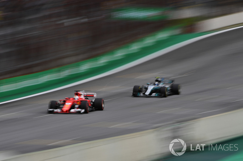 Sebastian Vettel, Ferrari SF70H and Valtteri Bottas, Mercedes-Benz F1 W08 sparks