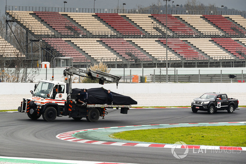 The car of Nikita Mazepin, Force India VJM11 is returned to the pits