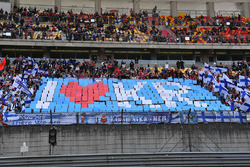 Kimi Raikkonen, Ferrari fans and banner