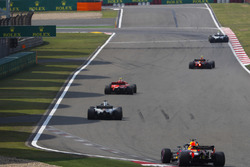 Kimi Raikkonen, Ferrari SF71H, Lewis Hamilton, Mercedes AMG F1 W09, and Daniel Ricciardo, Red Bull Racing RB14 Tag Heuer