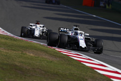 Лэнс Стролл, Williams FW41, и Маркус Эрикссон, Alfa Romeo Sauber C37