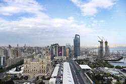 An aerial view of the pit straight, pit lane and surrounding buildings during Qualifying