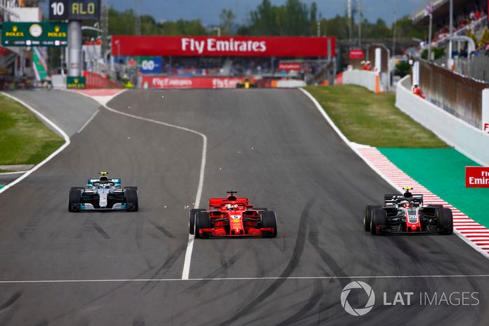Kevin Magnussen, Haas F1 Team VF-18, Sebastian Vettel, Ferrari SF71H y Valtteri Bottas, Mercedes AMG F1 W09