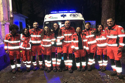 Mario Isola, racing manager Pirelli, al centro, guida un'ambulanza a Milano come volontario